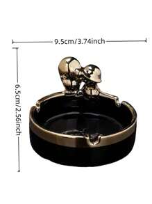 A Multi-Colored Ceramic Piece With Gilded Decoration And Luxurious Ashtray Is An Excellent Home Decor Item.