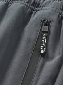 1条男士时尚户外运动裤，独特侧边印花装饰，实用拉链口袋，舒适弹力设计，支持动态运动。适合户外活动、旅行、健身、日常穿着、外出、居家和外出就餐。 - 灰色 - 查看 6