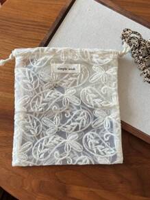 1个杏色复古蕾丝刺绣抽绳小布袋，可用作收纳袋、旅行整理袋、首饰袋、化妆包、零钱包、纸巾盒、卫生巾盒、礼品包装袋，适合旅行、上学、度假、生日、婚礼、新年等场合，也是女性必备的旅行配件。 - 彩色 - 查看 12