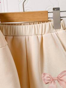 Conjunto de sudadera con cuello redondo y leggings con estampado de dibujos animados para niña preadolescente