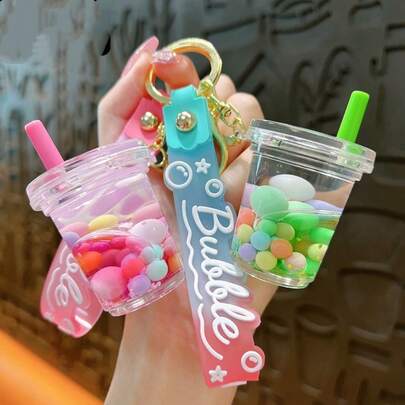 Llavero creativo de taza de té de leche de tapioca, accesorio delicado y lindo de péndulo de líquido de arena móvil, pequeño regalo