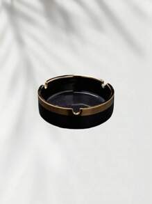 A Multi-Colored Ceramic Piece With Gilded Decoration And Luxurious Ashtray Is An Excellent Home Decor Item.
