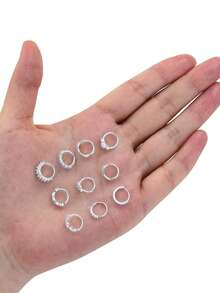 10 sztuk błyszczących kolczyków do nosa ze stali nierdzewnej platerowanych złotem/srebrem, z cyrkoniami AAA+, wzory kwiatowe/piórowe/gwiazdkowe, damskie – odpowiednie do noszenia na co dzień, na imprezy i jako biżuteria do ciała - Srebro - Zobacz 4