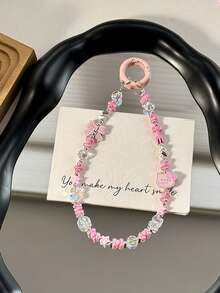 Sanrio 1 قطعة سلسلة هاتف معدنية بشكل القطة كارتون KT، شرابة هاتف ملونة من الأكريليك باللونين الأسود والوردي مزينة بالخرز