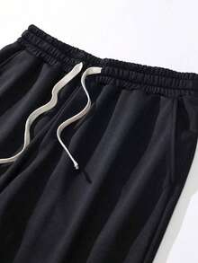 男士直筒裤 - 适合健身、休闲和日常正式场合，腰部抽绳，无弹力针织面料，适合健身房、办公室外出，可机洗，黑色裤子，纯色设计，柔软透气材质，宽松版型，适合春、夏、秋季户外休闲装，积极的生活方式 - 黑色 - 查看 4