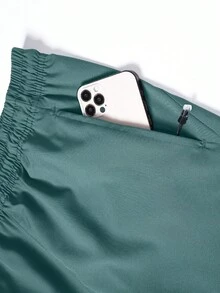 Bộ áo liền quần nam rộng rãi, có túi khóa kéo bên hông, dây rút điều chỉnh, thích hợp cho hoạt động thể thao ngoài trời, đạp xe, quần short thể thao mùa lễ Phục sinh. - Màu xanh Bạc hà - Xem 4