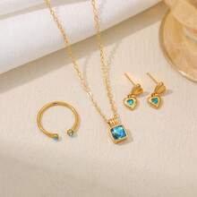 Bộ 3 món mạ đồng tối giản đính đá Cubic Zirconia và ngọc lục bảo giả. Dây chuyền, nhẫn hở và bông tai. - bộ đồ - Xem 7
