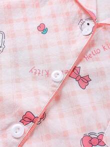 Sanrio Conjunto de 2 piezas de pijama para niñas y adolescentes con polo, cárdigan con bolsillos, estampado de Hello Kitty, flores y fresas, manga corta y pantalón corto, cómodo y casual