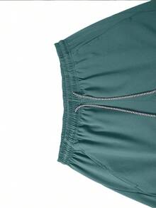 Bộ áo liền quần nam rộng rãi, có túi khóa kéo bên hông, dây rút điều chỉnh, thích hợp cho hoạt động thể thao ngoài trời, đạp xe, quần short thể thao mùa lễ Phục sinh. - Màu xanh Bạc hà - Xem 3