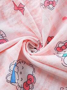 Sanrio Conjunto de 2 piezas de pijama para niñas y adolescentes con polo, cárdigan con bolsillos, estampado de Hello Kitty, flores y fresas, manga corta y pantalón corto, cómodo y casual