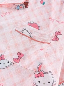 Sanrio Conjunto de 2 piezas de pijama para niñas y adolescentes con polo, cárdigan con bolsillos, estampado de Hello Kitty, flores y fresas, manga corta y pantalón corto, cómodo y casual