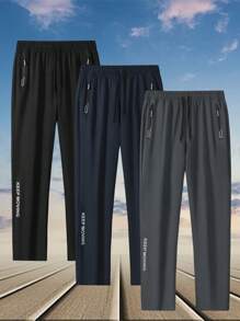 1条男士时尚户外运动裤，独特侧边印花装饰，实用拉链口袋，舒适弹力设计，支持动态运动。适合户外活动、旅行、健身、日常穿着、外出、居家和外出就餐。 - 灰色 - 查看 2