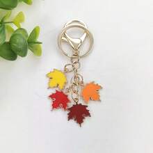 Llavero minimalista, de moda y encantador con hoja de arce y perla falsa, material de aleación DIY para accesorios de bolso, colgante, regalo memorable para amigos y familiares, accesorios para automóvil, accesorios para bolso, planta, perla falsa, gótico lindo, accesorios para bolso Y2K, cordones con soporte para identificación, accesorios para automóvil, encantos para bolso, ideas de regalo de Navidad, auto, maestro, hermana - Multicolor - Ver 10