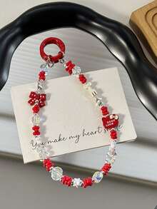 Sanrio 1 قطعة سلسلة هاتف معدنية بشكل القطة كارتون KT، شرابة هاتف ملونة من الأكريليك باللونين الأسود والوردي مزينة بالخرز