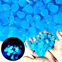 1000 حجر يضيء في الظلام يمتص الضوء كرسول غامض خلال النهار ويتألق كجنية خيالية في الليل. مناسب للبرك والحدائق ومسارات هالوين والممرات الخارجية والحصى.