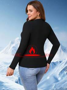 1件加大码V领长袖上衣，保暖加厚面料，纯色休闲修身百搭打底衫，适合户外活动、瑜伽、日常穿着，秋冬季穿着。