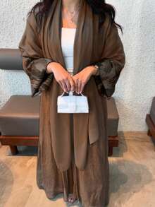 1 Chiếc áo Abaya nữ thanh lịch cổ điển in họa tiết hình học, tay áo phối hợp, thể hiện phong cách sang trọng và tinh tế, phù hợp cho mọi mùa và các sự kiện văn hóa, phù hợp cho cả ngày thường và các dịp trang trọng, phù hợp cho mọi mùa, các bữa tiệc đa năng, kỳ nghỉ và du lịch mùa xuân. - Cà phê nâu - Xem 3