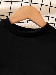 3pcs Girls Kids Fashion Minimalist Spring/Autumn Outfit Set: Black Crew Neck Cropped Long Sleeve Top, Solid Color Camisole, Denim Effect Letter Print Graphic Pants, Casual Comfortable Outdoor/Sports/Vacation Suit - Black - View 3