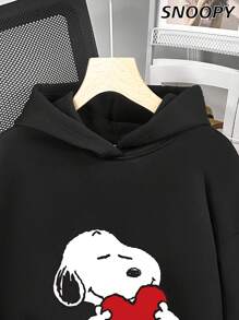 这款复古风格的卫衣印有“Holds A Heart”字样，采用怀旧经典的漫画图案，宽松版型，落肩设计，适合日常穿着，也适合秋冬季节。 - 黑色 - 查看 2