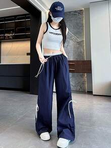 Pantalones anchos con cordón ajustable para mujer, de corte holgado e inspirados en la moda urbana, con trabillas y bolsillos, confeccionados en tejido de poliéster con detalle de lazo. - Azul Marino - Ver 3