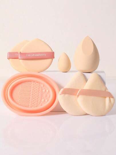 Set de 7 piezas de herramientas de maquillaje que incluye: 1 pieza de esponjas de maquillaje + 1 pieza de esponjas de maquillaje mini + 2 piezas de borlas de polvo triangulares + 2 piezas de borlas de polvo de cojín de aire + 1 pieza de herramientas de limpieza de brochas de maquillaje. Listo para regalar | Perfecto para principiantes/ella