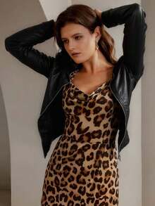 女士PU皮夹克 - 优雅简约的秋季风格，配有腰带、口袋和拉链，是一款女士冬季皮夹克