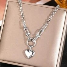 一套优雅的回形针项链和手链套装，配有心形吊坠，不锈钢材质，适合女性在派对或日常佩戴，也是情人节或母亲节的绝佳礼物。 - 金黃色 - 查看 10