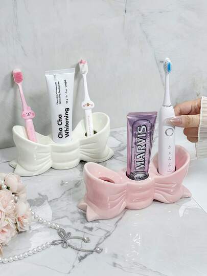 1个北欧风不对称蝴蝶结牙刷架，电动牙刷支架，化妆品收纳架，浴室台面装饰，家居桌面配件，房间装饰收纳架，节省空间的储物架，厨房/浴室/卧室配件，家居浴室装饰，夏季