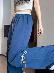 Pantalones anchos con cordón ajustable para mujer, de corte holgado e inspirados en la moda urbana, con trabillas y bolsillos, confeccionados en tejido de poliéster con detalle de lazo. - Azul oscuro - Ver 4