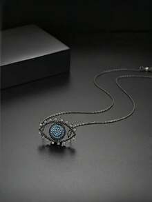 1 Peça de Colar de Olhos Azuis, um Colar Pingente de Zircônia Incrustado de Cobre. É um acessório elegante e criativo para vestidos formais, e também adequado para decorações de festas temáticas de Halloween. Pode ser dado como presente de Halloween para familiares e amigos, e também pode ser usado diariamente, sendo simples e elegante.