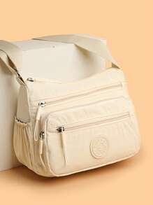 Sac à bandoulière en nylon décontracté avec sangle réglable, compartiments multiples, couleur unie, fermeture à glissière, doublure en polyester, sac bandoulière léger et pratique pour un usage quotidien