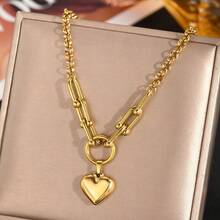 一套优雅的回形针项链和手链套装，配有心形吊坠，不锈钢材质，适合女性在派对或日常佩戴，也是情人节或母亲节的绝佳礼物。 - 金黃色 - 查看 9