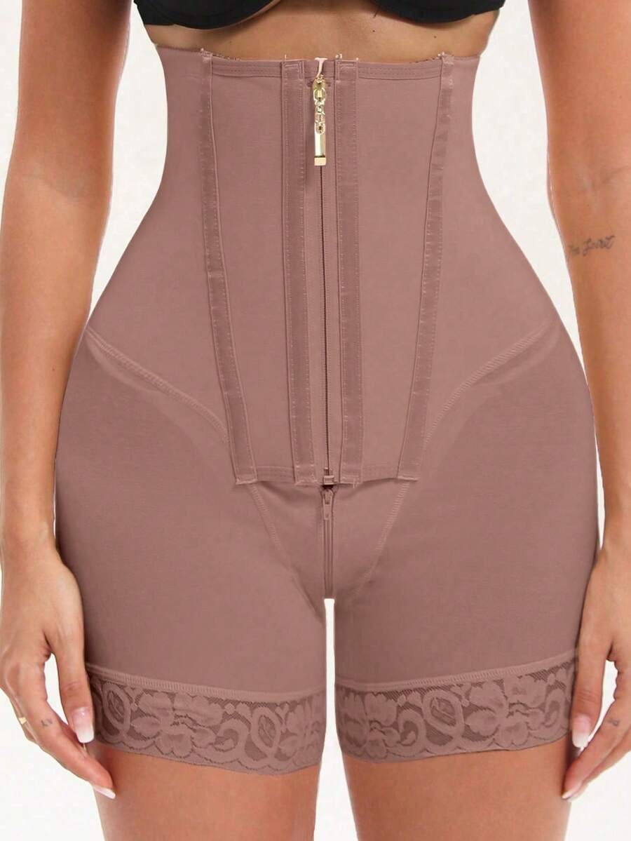 1 chiếc quần đùi định hình cạp cao có khóa kéo, giúp kiểm soát vòng bụng và nâng mông. - Màu tím hoa cà - Xem 1