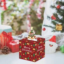 红色底座圣诞拉钱惊喜盒，圣诞树拉环，拉出圣诞惊喜，充满经典节日元素的创意礼物，彰显红色风格与互动惊喜