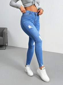 Pantalones vaqueros ajustados de tiro alto en azul claro con roturas, elásticos y moldeadores, de estilo casual moderno - Azul lavado medio - Ver 3