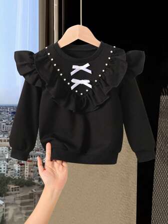 Girls' Elegant Pearl Bow Blouse, With Ruffle Hem + Pearl + Criss-Cross Bow Ribbon, Sweet & Chic With Sophistication, Suitable For School Uniform With Pleated Skirt Or Casual Wear, Autumn/Winter