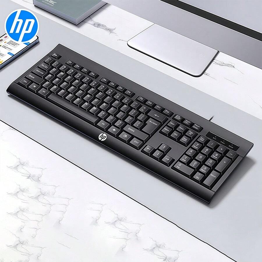 HP The KM100 Ergonomic Silent Keyboard Features A Scientifically Designed Stepped Keycap Layout To Alleviate Wrist Fatigue. It Also Features USB Plug-And-Play And Supports Switching Between Three Devices With One Click. It's A Great Choice For Students Taking Online Classes Or Working From Home. - Black - View 1