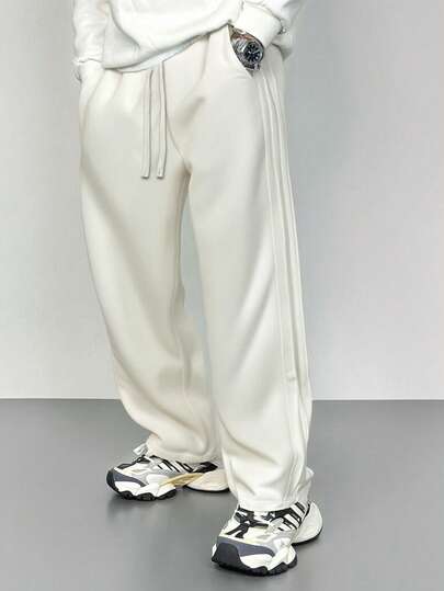 Pantalones anchos de pierna ancha con cintura con cordón y bolsillos, estampado de monedas vintage para hombre, otoño