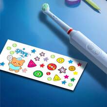 Orinatola Kids Electric Toothbrush, Comes With 4 Brush Heads, USB Rechargeable, 3 Cleaning Modes, Includes Travel Case And Cartoon Stickers, Built-In 600mAh Battery, Suitable For Children 3+ Years Old - Multicolor - View 5