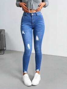 Pantalones vaqueros ajustados de tiro alto en azul claro con roturas, elásticos y moldeadores, de estilo casual moderno - Azul lavado medio - Ver 1