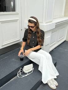 春夏新款黑色圆领纽扣半袖女式上衣，简约优雅通勤休闲开衫，新年系列