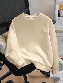 Pull ample à col rond avec imprimé lettre pour préadolescentes. Chemise de fond à manches longues pour l'automne et l'hiver. Haut abricot