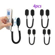 Soporte retráctil para control remoto con cierre magnético - Organizador de cables de  para múltiples controles remotos, diseño de montaje en pared ahorrador de espacio, compatibilidad universal para controles de TV/Aire acondicionado/Ventilador (Blanco/Negro)