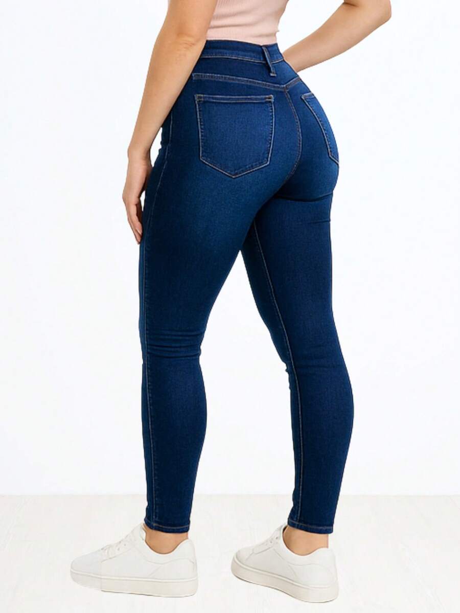 Jeans básicos talle alto un botón ajustados mezclilla gruesa efecto PUSH UP toda ocasión. - Azul lavado oscuro - Ver 1