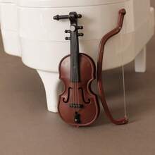 1pc Beautiful And Charming Miniature Violin - Retro-Style Plastic Musical Instrument, Suitable For Doll House Decoration, Collection Pendants And Creative Handmade Accessories, Shipped In Random Colors.