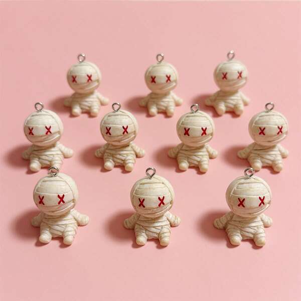 10 piezas Figura de momia sentada 3D apta para hacer joyas hechas a mano, colgantes, aretes, collares, pulseras, llaveros, encantos de bolso, piezas de artesanía de resina