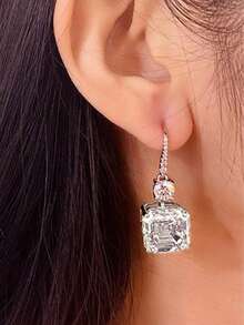 一对优雅的黄色立方氧化锆水滴耳环，适合作为情人节礼物送给女性。 - 銀色 - 查看 4