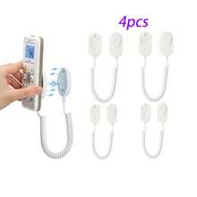 Soporte retráctil para control remoto con cierre magnético - Organizador de cables de  para múltiples controles remotos, diseño de montaje en pared ahorrador de espacio, compatibilidad universal para controles de TV/Aire acondicionado/Ventilador (Blanco/Negro)