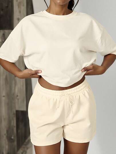 Bộ 2 món áo thun ngắn tay cổ tròn màu trơn dáng rộng và quần short nữ, thích hợp cho đi chơi, thể thao, bộ đồ thể thao tay ngắn màu mơ, bộ đồ chạy bộ đơn giản, trang phục dự tiệc, tốt nghiệp, lễ Phục sinh, trang phục Ngày của Mẹ mùa hè