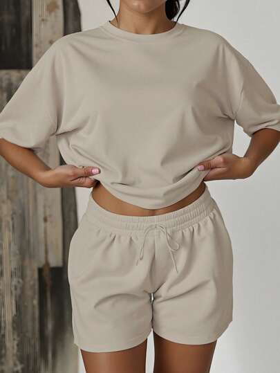 2pcs Women Casual Loose Solid Color Round Neck Short Sleeve T-Shirt And Shorts Set, Suitable For Outings, Sportswear, Thanksgiving, Christmas Casual Wear